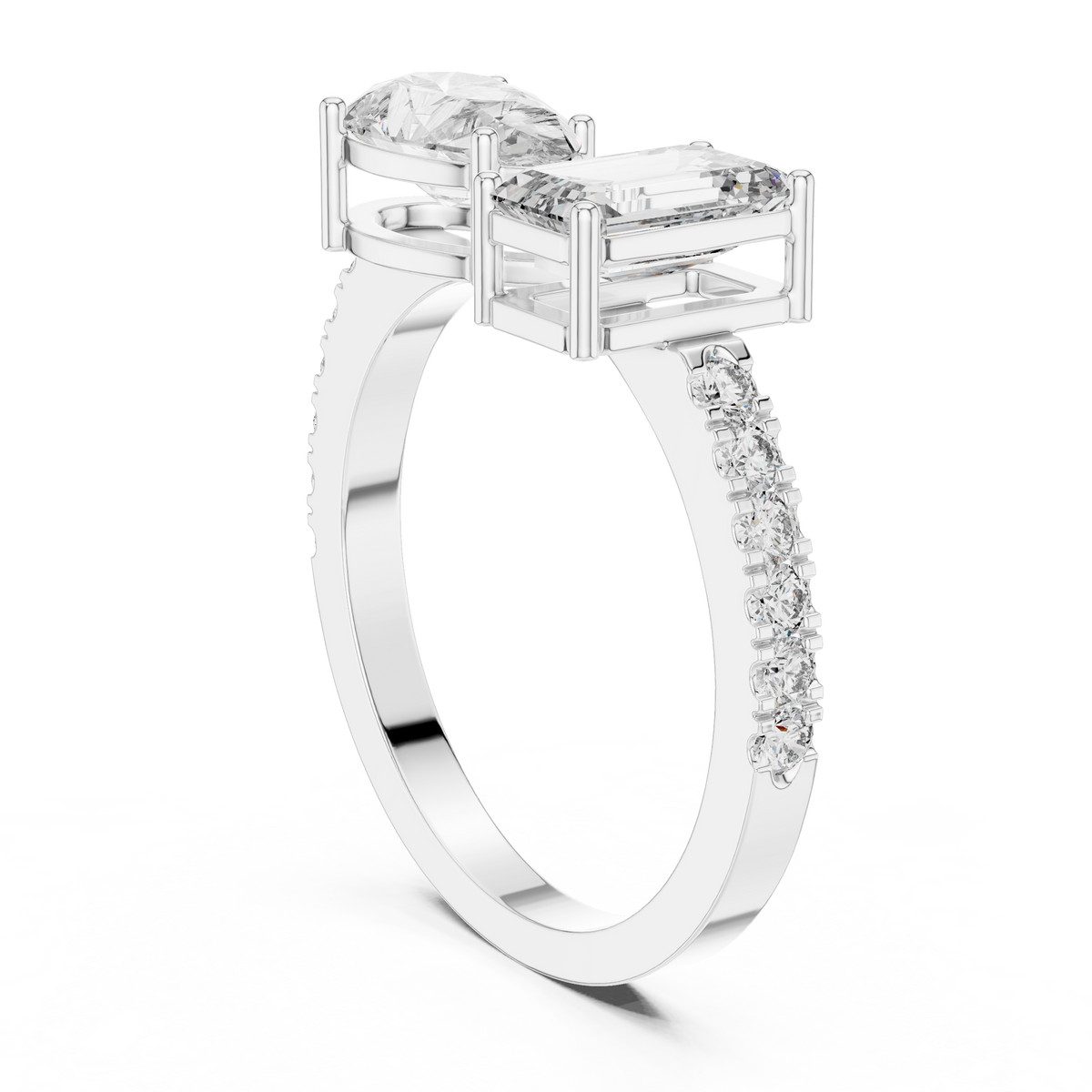 Twin Emerald and Pear Diamond Ring