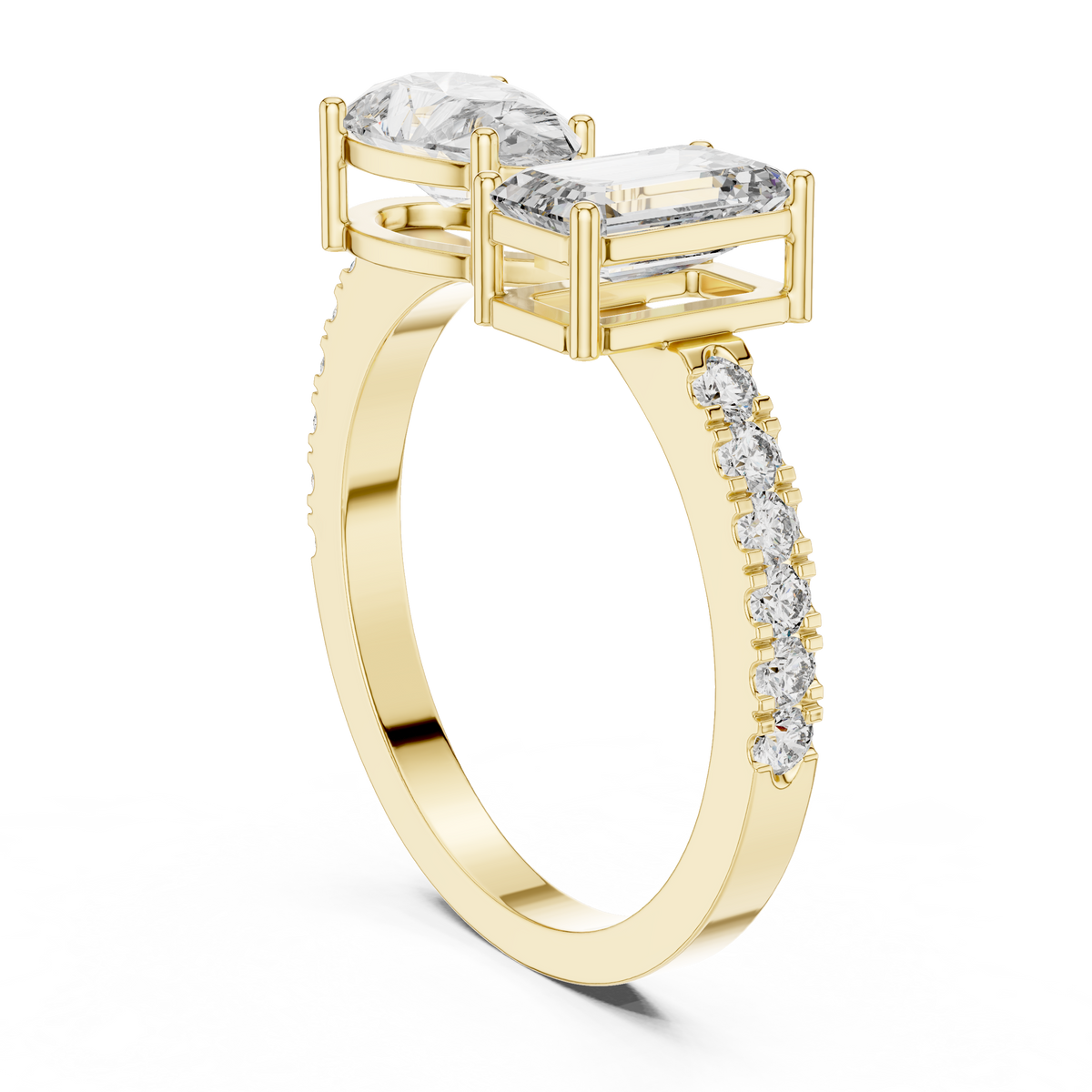 Twin Emerald and Pear Diamond Ring