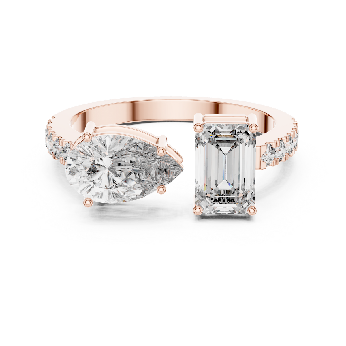 Twin Emerald and Pear Diamond Ring