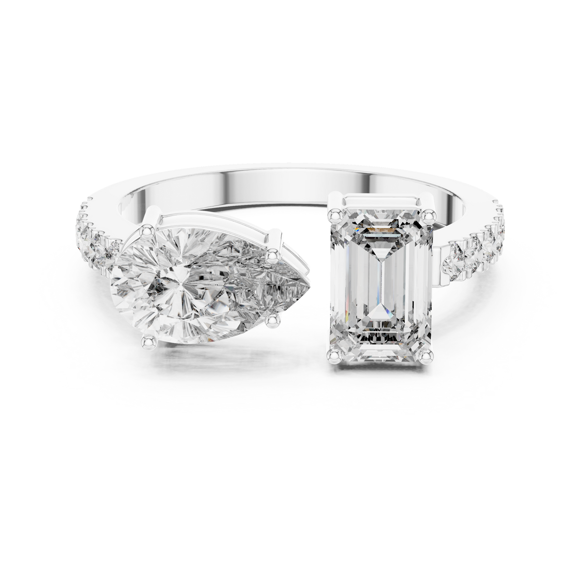 Twin Emerald and Pear Diamond Ring