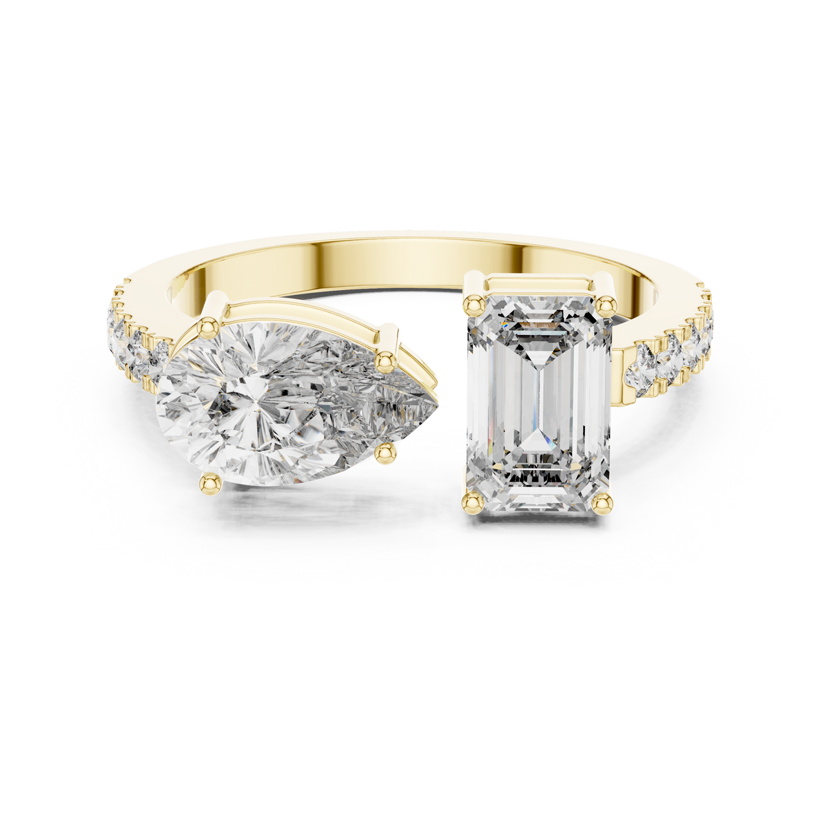 Twin Emerald and Pear Diamond Ring
