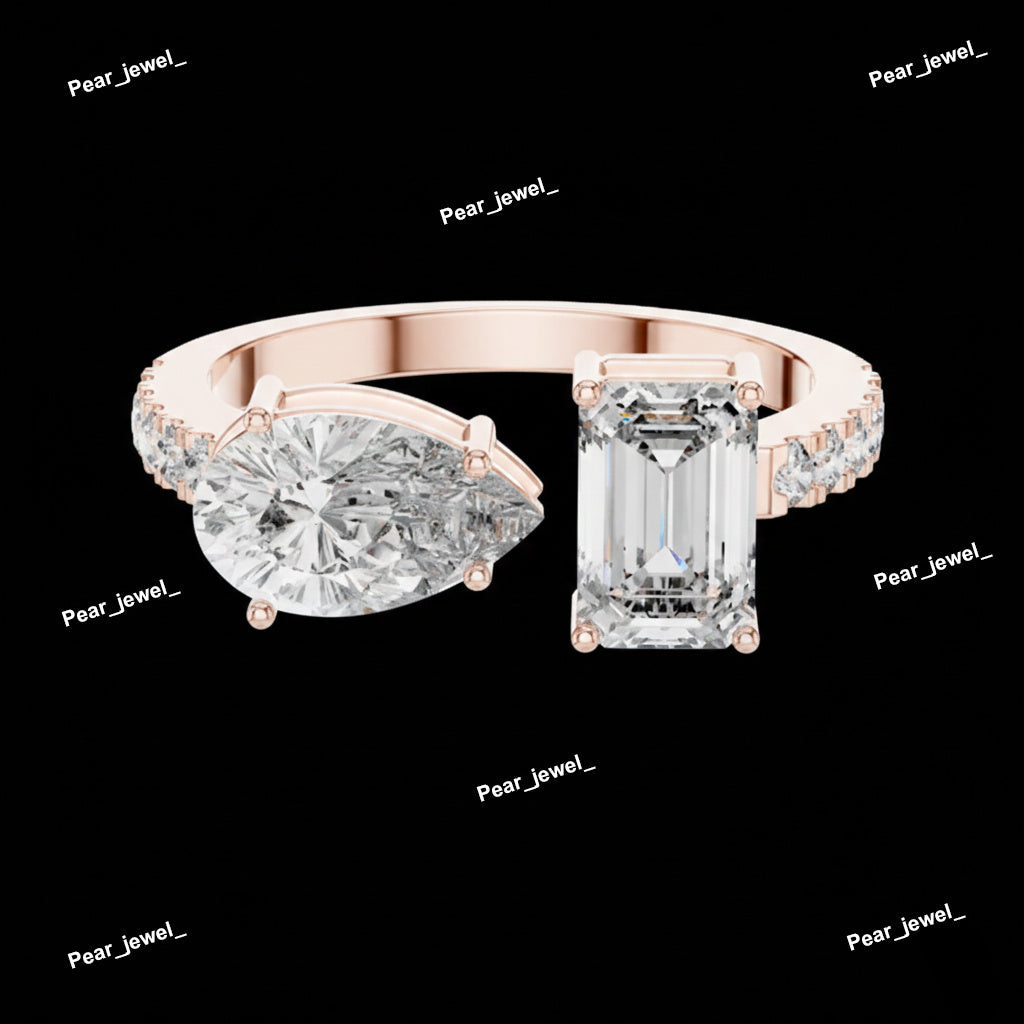 Twin Emerald and Pear Diamond Ring
